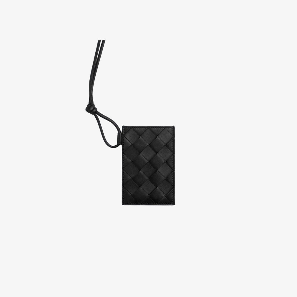 LUGGAGE TAG HOLDER