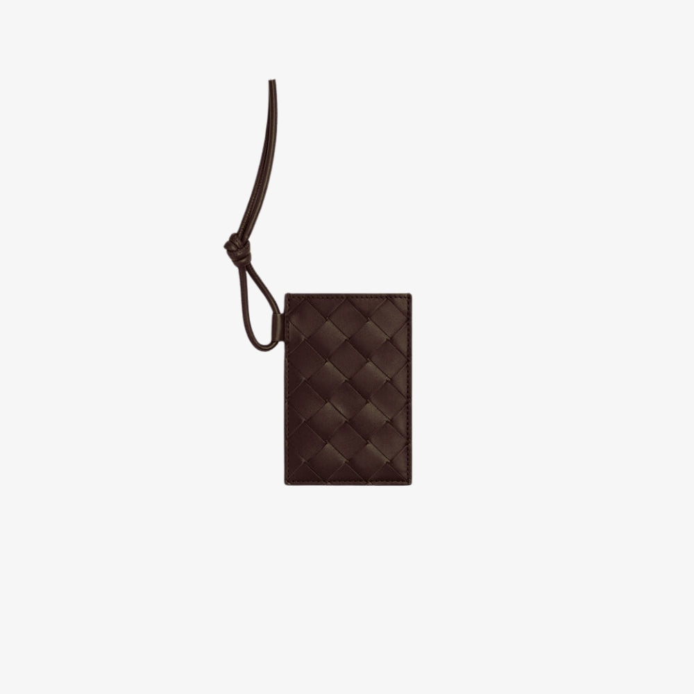 LUGGAGE TAG HOLDER